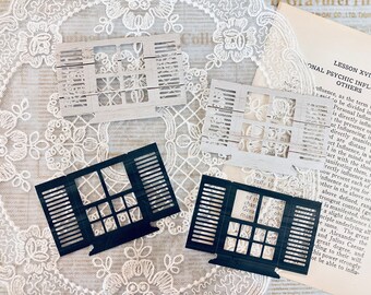 A set of 4 handmade windows die cuts for card making, scrapbooking, junk journaling, bullet journaling and any other paper projects.