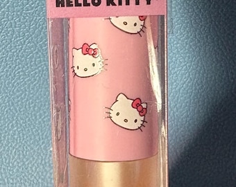 Nuovo, mai usato. The Creme Shop Hello Kitty Kawaii Kiss Olio labbra idratante Vaniglia Menta Olio di jojoba Vitamina E Sanrio