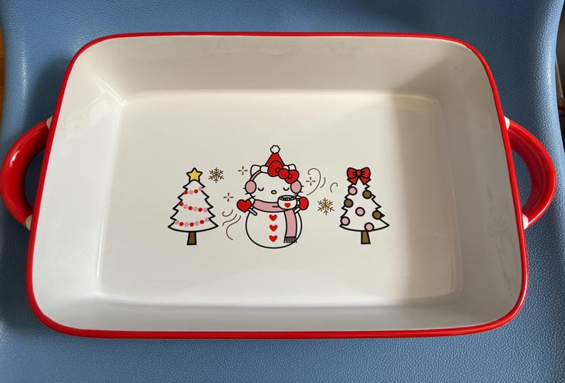 Sanrio Hello Kitty Christmas Snowman Sipping Cocoa Trees Ceramic 9 x 12 Christmas Winter New Unused Holiday Collectible Cute Baking Handles