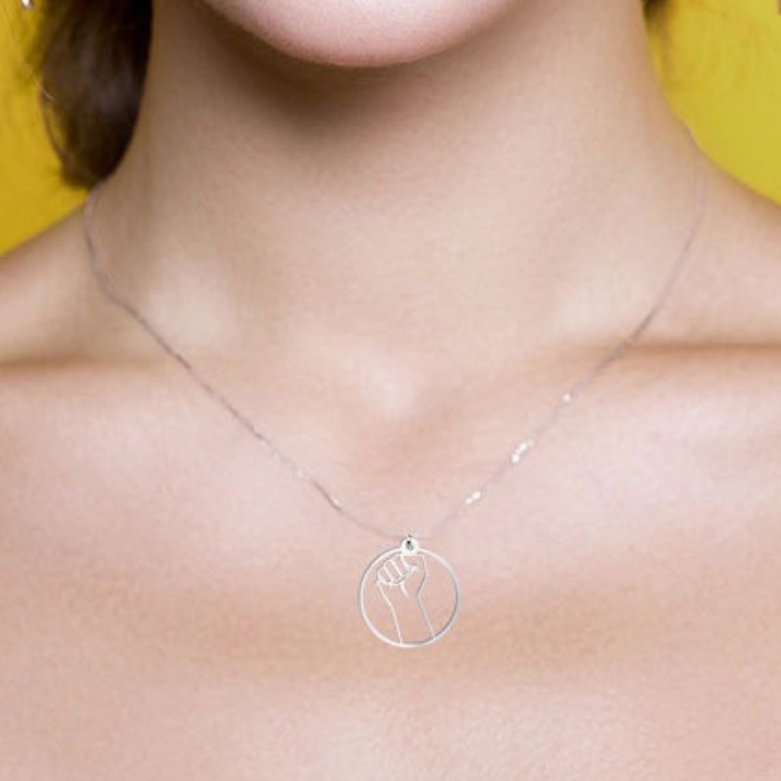 Girl power necklace is the perfect feminist jewelry gift idea.  Etsy