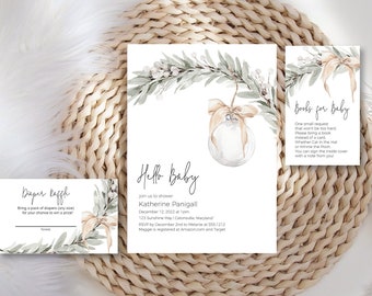 May include: A set of three printable baby shower cards with a watercolor design of a Christmas ornament hanging from a branch with green leaves. The cards include a diaper raffle, a books for baby card, and a baby shower invitation. The text on the invitation reads "Hello Baby" and includes the name "Katherine Pangilinan".