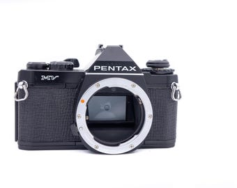 Pentax MV  film camera in good condition ( body only ) with new light seals