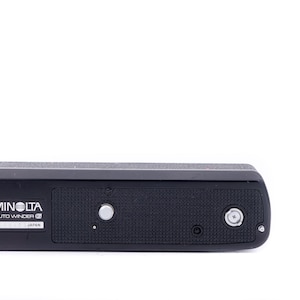 Motor de arrastre automático Minolta Auto Winder G para cámaras X-300, X-500, X-700 y serie XG.