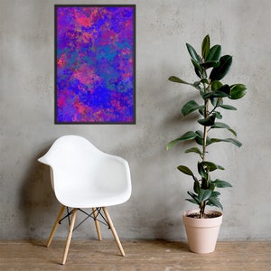 May include: Framed abstract art print with a vibrant mix of colors. The artwork features a blend of blue, pink, and teal hues, creating a dynamic and modern aesthetic. The print is encased in a black frame, ready to hang.