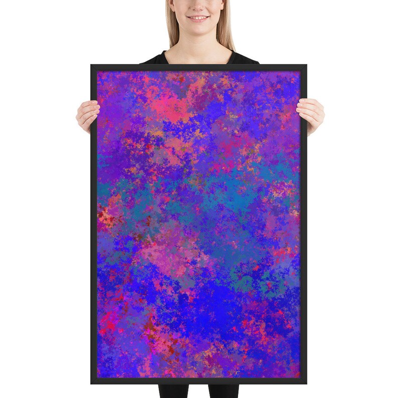 May include: A framed abstract art print featuring a vibrant mix of colors. The artwork showcases a blend of blues, purples, pinks, and touches of orange and green, creating a dynamic and visually engaging composition. The frame is black.