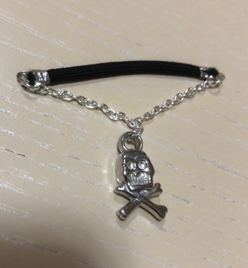Elastic penis ring with skull