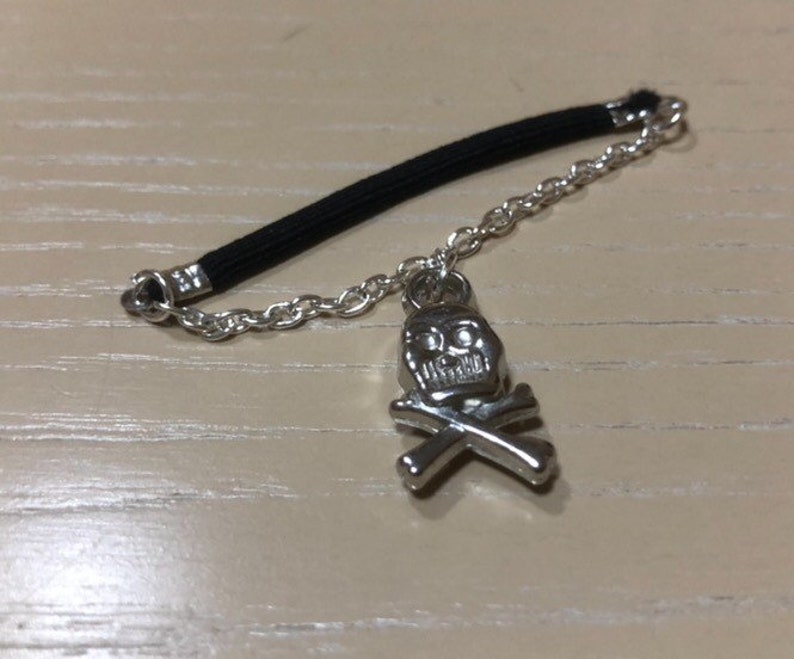 Elastic penis ring with skull