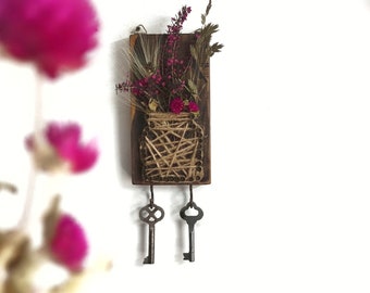 Small vertical wooden key holder for a wall with pocket for dried flowers, Recycling wood rustic entryway wall organizer with brass hooks