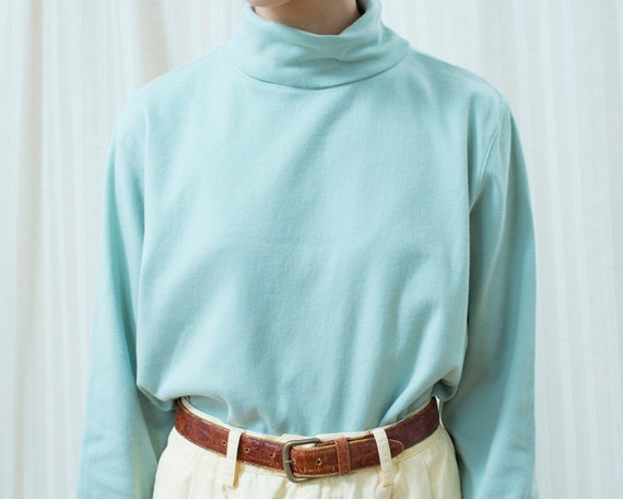 mint green turtleneck