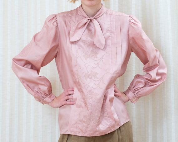 pink puffy blouse
