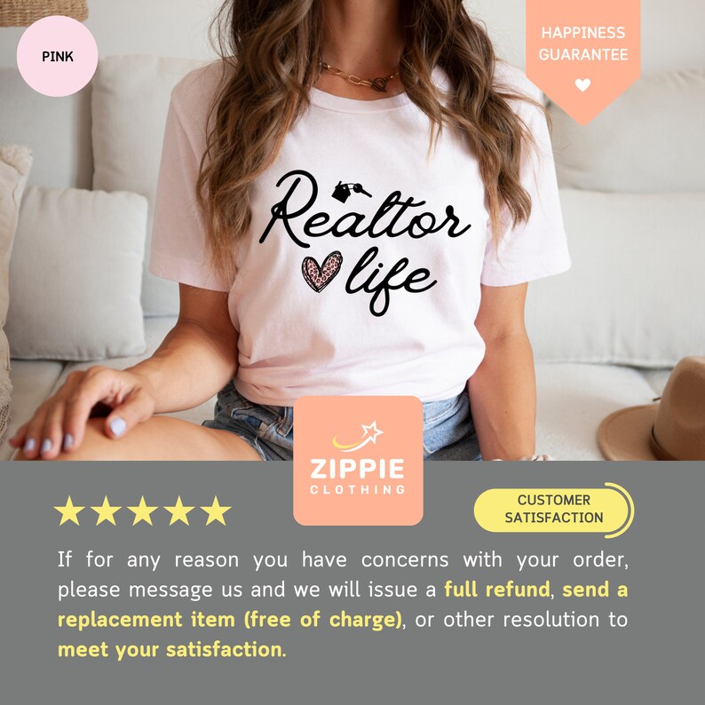 May include: White t-shirt with the text "Realtor life" in black with a pink heart and house keys graphic. The shirt is being modeled by a person sitting on a couch. The text "Happiness Guarantee" is in the top right corner of the image.