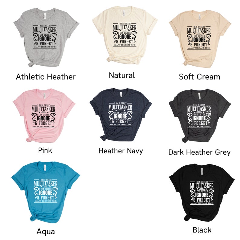May include: A set of ten t-shirts in various colors, each featuring the text "I am a great multitasker I can listen ignore & forget all at the same time".