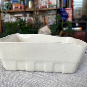 Ceramic cast berry carton bowl