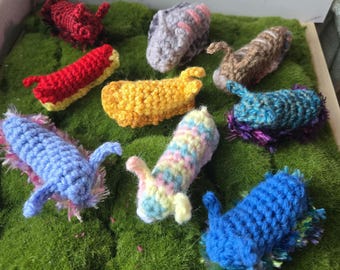 Crochet Pocket Sea Slug Plushie: One-of-a-Kind Mystery Box - Pocket Support Slug
