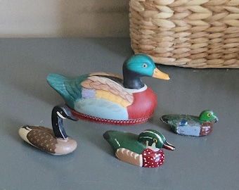 Duck Collection - set of 4 -  Two Carved Wood One Iron and One Painted Stone - Hand Crafted Signed