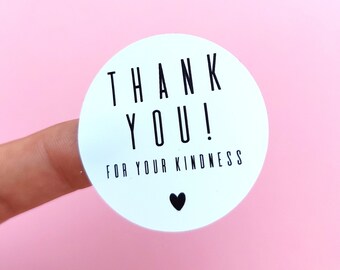 May include: White round sticker with black text that says "THANK YOU! FOR YOUR KINDNESS" with a small black heart at the bottom.