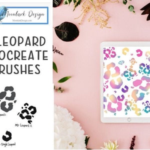 May include: A digital art design featuring a tablet displaying colorful leopard print patterns. The image includes the text "3 LEOPARD PROCREATE BRUSHES" and the Moonlark Design logo. The background is a light pink with floral and leaf accents.