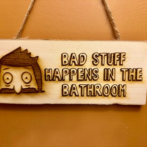 Bob's Burgers - Bad Stuff Happens in the Bathroom sign