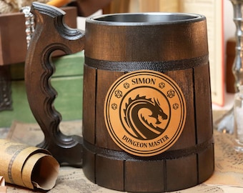 May include: A brown wooden beer stein with a black leather patch featuring a dragon and the text "Simon Dungeon Master".