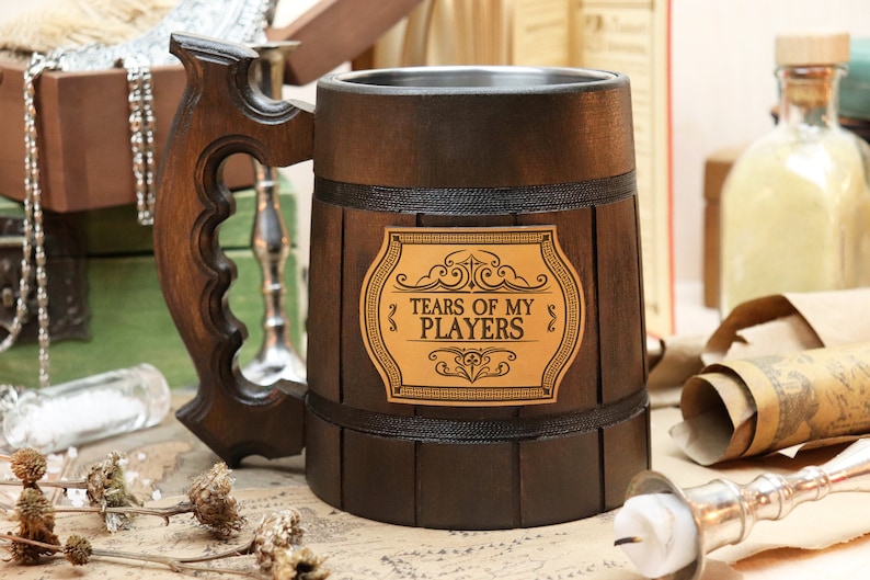 A handcrafted beer mug featuring a tears of my players design, perfect as a DND player or DM birthday gift