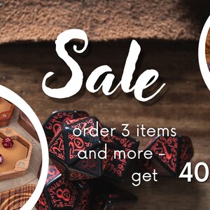 May include: Sale banner with a pile of black and red dice with red numbers. The text reads "Sale, order 3 items and more - get 40% OFF".