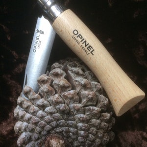 Opinel 7VRI Penknife With a Stainless Steel Blade Beech Handle Locking knife.
