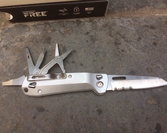 Leatherman Free K4X Folding knife with serrated and straight blade & belt pouch