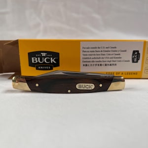 Buck Solo small easy opening occasional use pocket knife in wood grain & silver