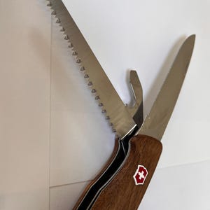 Victorinox 'RangerWood' Reddot award winner! 10 Functions Locking blade & Saw