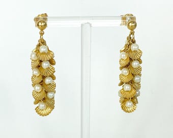 Brincos vintage Avon de sereia em tom dourado