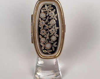 Espejo portapintalabios negro y dorado de Hong Kong