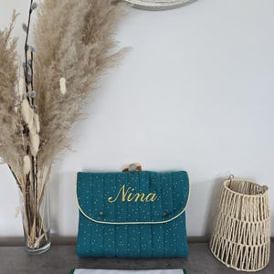 tapis à langer nomade personnalisé en double gaze de coton à pois dorés