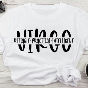 May include: White t-shirt with black text that reads "Virgo" and "Reliable - Practical - Intelligent".