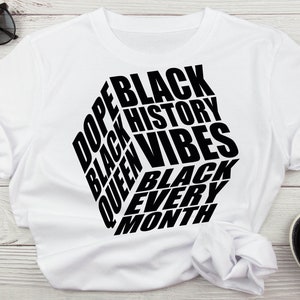 May include: White t-shirt with black text that reads "Dope Black History Queen Vibes Black Every Month".