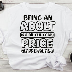 May include: White t-shirt with black text that reads "Being an Adult is a bit out of my price range right now".