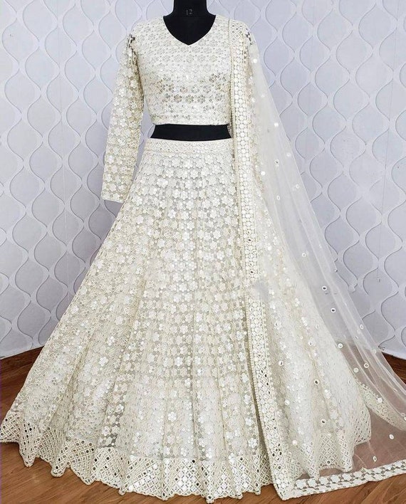 white lehenga with black blouse