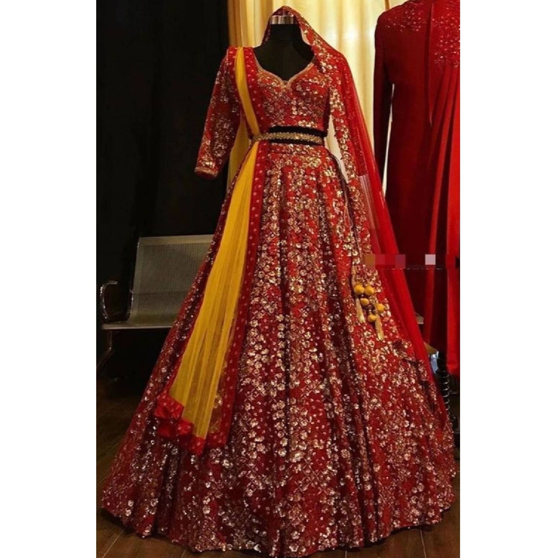 red and yellow bridal lehenga
