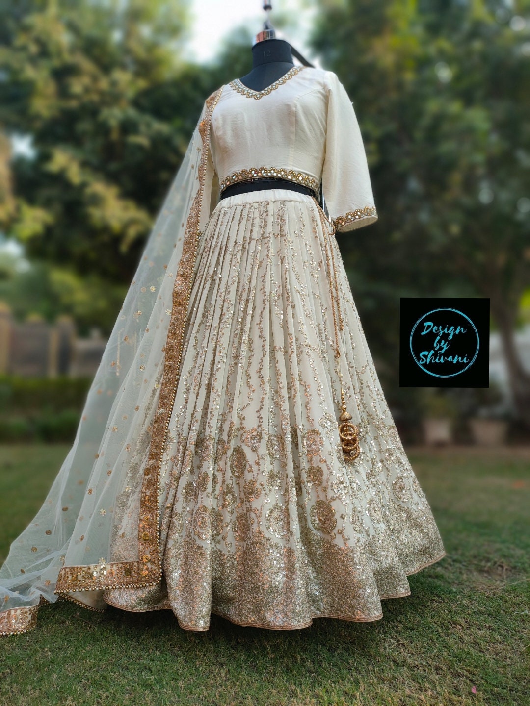 Ivory And Gold Lehenga Choli Set