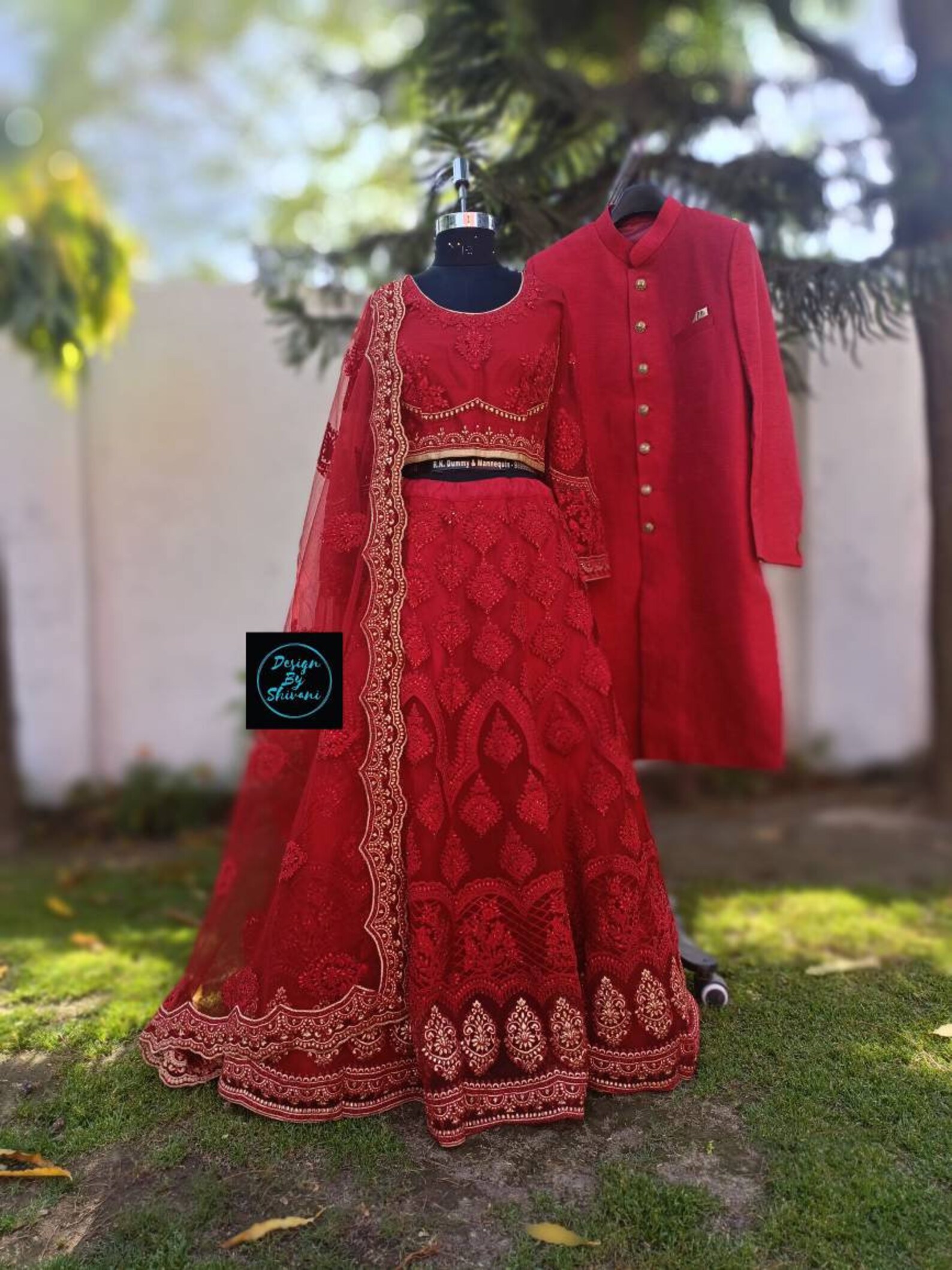 matching sherwani with red lehenga