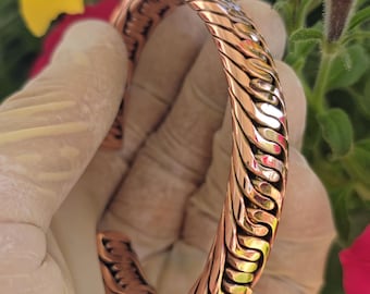 Multiple personalities alternating dime layers and barbed wire pattern