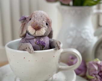 Teddy bunny in a dress. Lavender plush rabbit, collectible plush rabbit. Ideal as a gift.