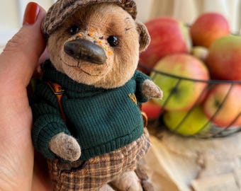 Cute honey-colored bear in clothes. Teddy bear custom. Handmade bear made of OOAK - stuffed with sawdust.