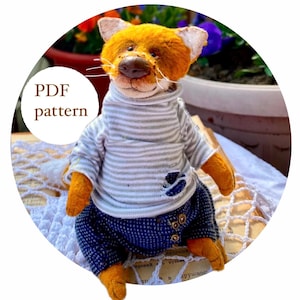 Pattern of a fox and clothes for him. Pattern of a little fox plush. Pattern of a cute plush fox.