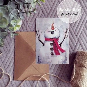May include: A watercolor painting of a snowman with a red scarf and a carrot nose. The snowman is smiling and has a tongue sticking out. The painting is on a white background.