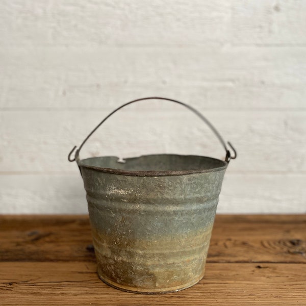 Vintage galvanized metal bucket with handle