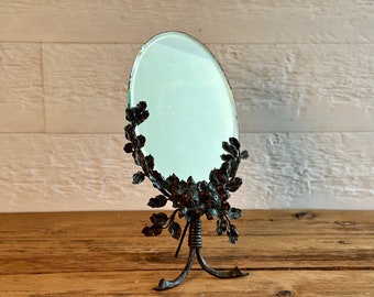 Antique Art Nouveau vanity table mirror with cast iron floral base, from Belgium, circa 1920s