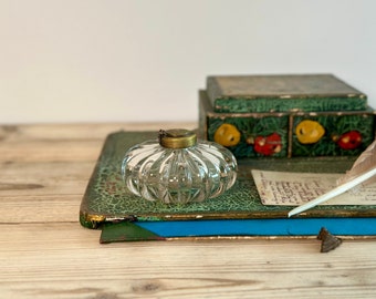 Antique glass inkwell with ornate brass hinged lid for calligraphy dip pen, circa 1910s
