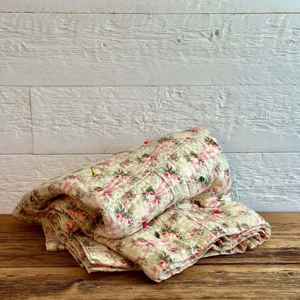 Antique whole cloth quilt, with pink, green, beige white floral chintz, and wool ties, entirely hand-stitched, circa 1930s