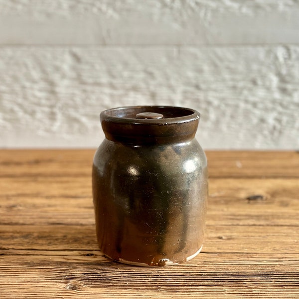 Small antique stoneware crock pantry jar with a lid