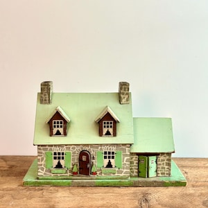 Antique folk art dollhouse, hand-made and painted miniature toy house, from Québec, Canada, circa 1900s